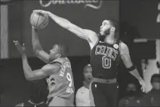  ?? ASSOCIATED PRESS ?? BOSTON CELTICS’ JAYSON TATUM (0) blocks the shot of Toronto Raptors’ Serge Ibaka (9) during the second half of an NBA conference semifinal playoff game Monday in Lake Buena Vista, Fla.