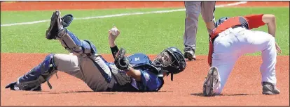  ?? GREG SORBER/JOURNAL ?? Altamont catcher Jared Kane rolls over after tagging out Petroglyph’s Jaron Chavez on a rundown during the sixth inning of Sunday’s Junior League Baseball Southwest Regional.