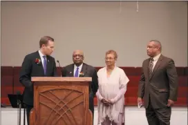  ?? RICH HUNDLEY III — FOR THE TRENTONIAN ?? Hamilton Mayor Jeff Martin, left, presented the Spirit of Community Service Award to James Stevenson, second from left, Thursday at the township’s annual Martin Luther King Jr. Ceremony.