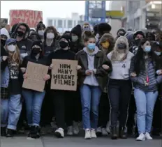  ?? Jay LaPrete/Associated Press ?? Students walk down High Street in Columbus, Ohio, on Wednesday to protest Tuesday’s fatal shooting of Ma'Khia Bryant by a police officer.