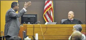  ?? KENT D. JOHNSON / KDJOHNSON@AJC.COM ?? Defense witness Mario Watkins explains his late arrival to Fulton County Superior Court Judge Jerry Baxter on Thursday. Watkins said he was held up by traffic on I-20.