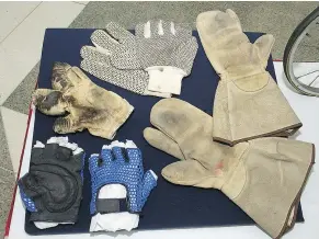  ?? — BILL KEAY/PNG FILES ?? Rick Hansen wore a number of different gloves during his Man in Motion tour 30 years ago, now one of them will be on display at the Canadian Museum of History in Ottawa.