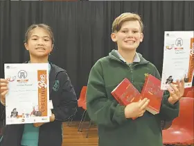  ?? PHOTO: SUPPLIED. ?? Premier’s Spelling Bee regional final junior division winner Jake Martine, Baradine Central, and runner up Sophia Nuguid, Orana Heights.