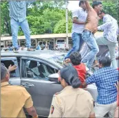  ??  ?? The car of BJP MP Heena Gavit from Nandurbar is damaged by hooligans.