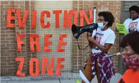  ??  ?? Community members protest against evictions outside the Bronx housing court in New York. Photograph: Angela Weiss/AFP/Getty Images