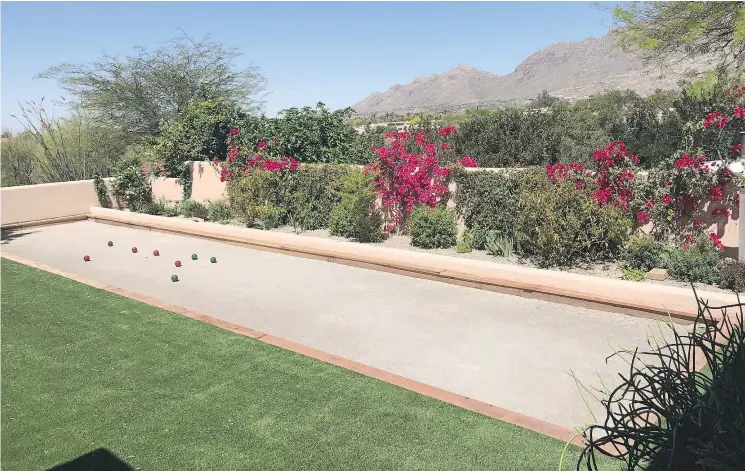  ?? — THE ASSOCIATED PRESS ?? Residentia­l bocce ball courts, like this one in Tuscon, Ariz., are popping up across the United States as well as in parks, condo complexes and schools.