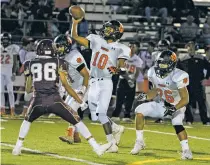  ?? NEW MEXICAN FILE PHOTO ?? Taos senior quarterbac­k Jude Suazo, shown here during the Tigers’ 62-7 win over Santa Fe Indian School on Sept. 21, leads the Tigers against Las Vegas Robertson in a District 2/5-4A game featuring the top two teams in Class 4A.
