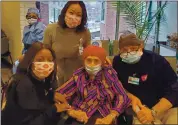  ?? MIRA ROSENBLATT VIA THE NEW YORK TIMES ?? Mira Rosenblatt, center, with staff members at Mount Sinai Brooklyn, including Sylvie Jean Baptiste, left, and Kristine Ortiz, in the gray sweater.