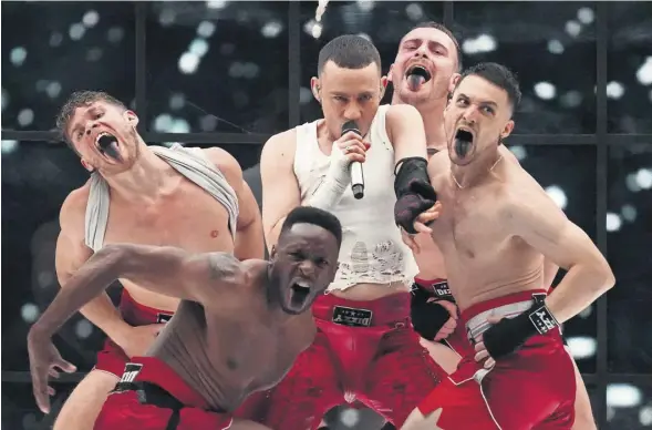  ?? PHOTOGRAPH: MARTIN MEISSNER/AP ?? Olly Alexander performs the UK entry Dizzy at the grand final of the Eurovision song contest in Malmö