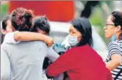  ?? AFP ?? Family members and relatives of passengers on board the Twin Otter aircraft weep outside the airport in Pokhara on Sunday.