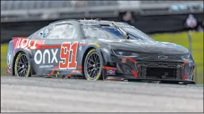  ?? Stephen Spillman
The Associated Press ?? Former Formula One champ Kimi Raikkonen steers his car Saturday during NASCAR Cup qualifying at Circuit of the Americas in Austin, Texas.