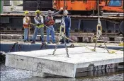  ?? LANNIS WATERS / THE PALM BEACH POST ?? Palm Beach County Environmen­tal Resource Management officials say other reef projects have increased oysters, snook and bonefish.