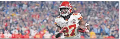  ?? [KELVIN KUO/THE ASSOCIATED PRESS] ?? Chiefs running back Kareem Hunt carries during the second half against the Rams on Nov. 19 in Los Angeles.