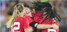  ?? THE CANADIAN PRESS ?? Team Canada celebrates their bronze win in women’s rugby sevens, above. Penny Oleksiak, right, with her four medals.