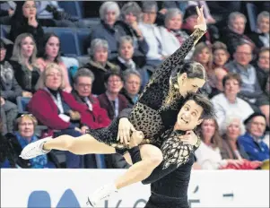  ?? CP PHOTO ?? Canada’s Tessa Virtue and Scott Moir perform their short dance in the ice dance competitio­n at Skate Canada Internatio­nal in Regina on Friday.