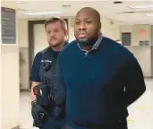  ?? CARL HESSLER JR./MEDIANEWS GROUP ?? Blair Watts is escorted by a deputy sheriff from a Montgomery County courtroom during a break at his homicide trial on Dec. 8.
