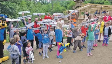  ?? 01_A27wild02 ?? Children join Paw Patrol in cheering the arrival of the new playpark.