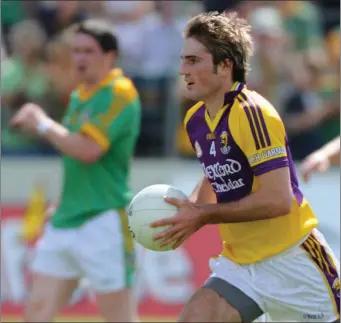  ??  ?? Brian Malone carrying the ball out of defence on that memorable day in Carlow in 2008 when Meath were left stunned by an incredible Wexford comeback.