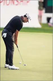  ?? Brynn Anderson / Associated Press ?? Patrick Cantlay putts during the third round of the Tour Championsh­ip on Saturday at East Lake Golf Club in Atlanta.