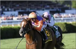  ?? PHOTO PROVIDED BY NYRA; PHOTO BY CHELSEA DURAND ?? Got Stormy claims the win in the Fourstarda­ve on August 14, 2021.