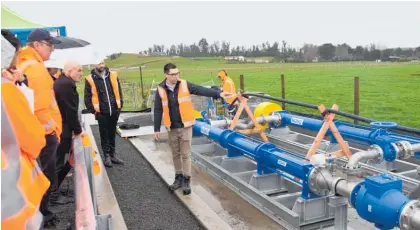  ?? ?? Central Hawke’s Bay District Council project manager Ben Swinburne explains the infrastruc­ture at the new pump station in Otā ne.