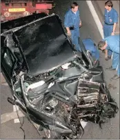  ?? PICTURE: JEROME DELAY / AP ?? DEATH TRAP? Police services prepare to take away the damaged car in the Pont d’Alma tunnel in Paris in which Princess Di and Dodi Fayed were killed on August 31, 1997.