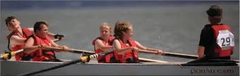  ?? Fossa U-14 Mixed crew at the Kerry County Coastal Rowing Championsh­ips at Fenit Harbour ??