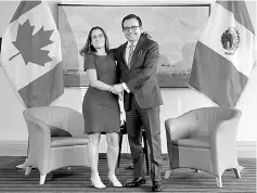  ??  ?? Canadian Minister of Foreign Affairs Freeland shakes hands with Mexican Secretary of Economy Guajardo before the first round of talks to renegotiat­e the NAFTA at the Embassy of Canada in Washington, US. The US, Canada and Mexico on Wednesday opened...