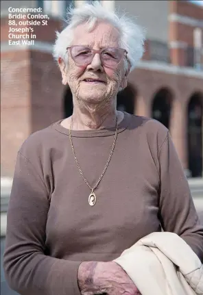  ??  ?? Concerned: Bridie Conlon, 88, outside St Joseph’s Church in East Wall