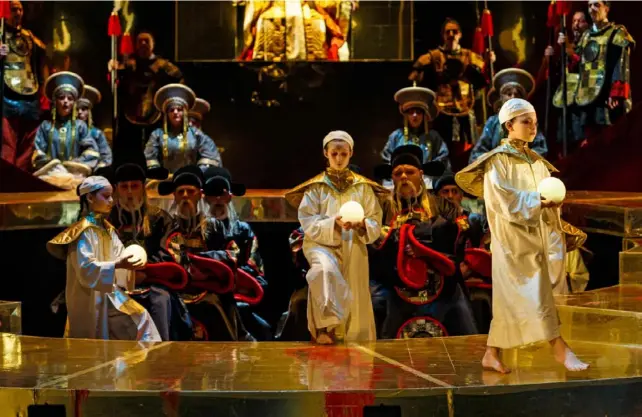  ?? David Bachman ?? Members of the Pittsburgh Youth Chorus perform in Pittsburgh Opera’s 2017 production of “Turandot.” It was the first opera Gene Welsh saw with his husband, Marty Healey.