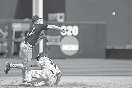  ?? NATHAN J. FISH/THE OKLAHOMAN ?? Dallas Baptist’s Luke Heefner (12) forces out OSU’s Chase Adkison (33) at second base during Saturday’s game at O’Brate Stadium in Stillwater.