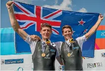  ?? STEVE MCARTHUR/ROWING NZ ?? The New Zealand’s men’s double sculls crew of Chris Harris and John Storey celebrate their gold at the world rowing champs in Florida, US.