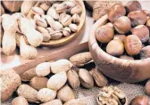  ?? DREAMSTIME ?? A study of postmenopa­usal women showed that substituti­ng nuts for meat and dairy results in fewer deaths from heart disease.