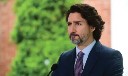  ?? Kilpatrick/AFP/Getty Images ?? Justin Trudeau: ‘This was an incredibly harmful government policy that was Canada’s reality formany, many decades.’ Photograph: Sean