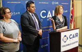  ?? THE DISPATCH ?? From left, Amanda Pritt of US Together, Romin Iqbal of CAIR and Angie Plummer of the Community Refugee & Immigratio­n Services respond to the Supreme Court’s decision Tuesday upholding President Donald Trump’s travel ban.