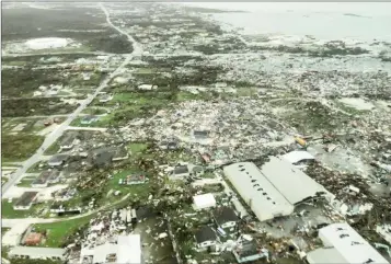  ??  ?? An aerial view shows devastatio­n after hurricane Dorian hit the Abaco Islands in the Bahamas, September 3, 2019, in this image obtained via social media. Michelle Cove/Trans Island Airways/via REUTERS