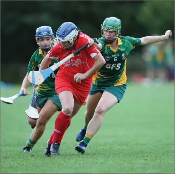  ??  ?? Glenealy’s Vicky Coen comes under pressure from Knockanann­a’s Laura Hogan.