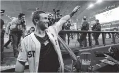  ?? THE ASSOCIATED PRESS ?? The Houston Astros’ Alex Bregman celebrates after driving in the game-winning run during the 10th inning of Game 5 of the World Series on Sunday against the Los Angeles Dodgers in Houston. The Astros won 13-12 to take a 3-2 lead in the series.