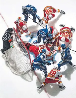  ?? MARK BLINCH GETTY IMAGES ?? A teammate praises the work ethic of William Nylander, bottom right, scoring Wednesday’s tying goal. But Leafs coach Sheldon Keefe says he has to be more consistent and more engaged.