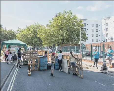  ?? Pictures: Portsmouth City Council ?? BUILDING DENS Above and below, the Play and Plants event held by Portsmouth City Council to share plans for the Horatia and Leamington Houses site