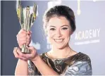  ??  ?? Tatiana Maslany, left, won best lead actress in a drama for Orphan Black. Sarah Gadon, right, was named best lead actress in a limited series for Alias Grace.