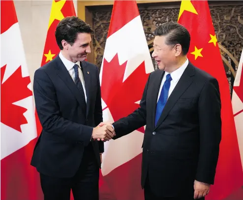  ?? SEAN KILPATRICK / THE CANADIAN PRESS ?? Prime Minister Justin Trudeau with Chinese President Xi Jinping at Diaoyutai State Guesthouse in Beijing Tuesday.