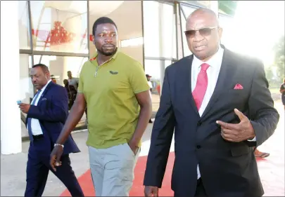  ??  ?? SMART PARTNERS ... ZIFA president Philip Chiyangwa (right) and Prophet Walter Magaya share notes during a tour of Yadah Hotel complex last month which has again been opened for the Warriors ahead of their CHAN qualifier against Namibia