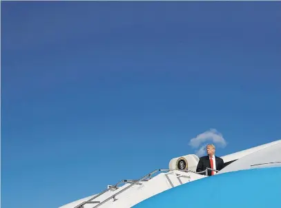  ?? Picture: Leah Millis/Reuters ?? THE EAGLE HAS LANDED. US President Donald Trump boards Air Force One for travel to Ohio at the Morristown Airport in Morristown on August 4.