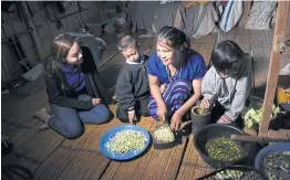  ??  ?? At Ban Pang Tong School, renewable energy is used to light up its dormitory. Solar-powered lanterns provide light at night in the homes of students in another school, also in Mae Hong Son.