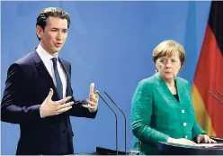  ?? AP ?? German Chancellor Angela Merkel, (right) and Chancellor of Austria Sebastian Kurz, address the media during a joint press conference after a meeting at the chanceller­y in Berlin, Germany, yesterday.