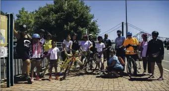  ?? OUTDOOR AFRO ?? Rue Mapp, far left, the CEO and founder of Outdoor Afro, leads a bike trip in Vallejo in July 2019.