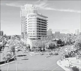  ?? BH Garden & Open Space Initiative ?? A RENDERING of the Hilton tower at Wilshire and Santa Monica boulevards. The proposed 26-story project would be built next to the landmark Beverly Hilton.