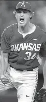  ?? NWA Democrat-Gazette/J.T. WAMPLER ?? Arkansas pitcher Jake Reindl pumps his fist and celebrates with a shout as the Razorbacks kept their NCAA Tournament hopes alive with a 4-3 victory over Oral Roberts on Sunday.