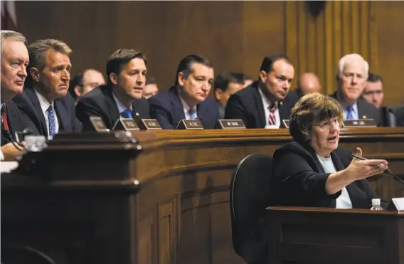  ?? Tom Williams / Associated Press ?? Rachel Mitchell, an Arizona sex crimes prosecutor, questions Christine Blasey Ford on behalf of Republican senators on the Senate Judiciary Committee.